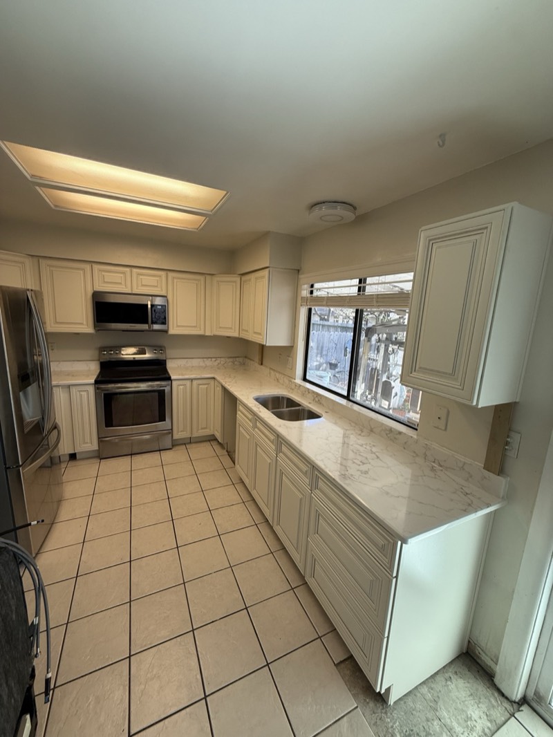 Gray shaker kitchen cabinets in an Atlanta home