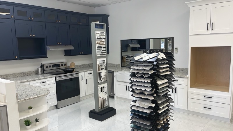 Inside the MNK Cabinet showroom in Norcross with display kitchens and door samples